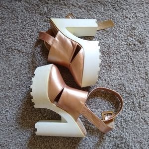 Rose gold platform heels, Bucco Capensis